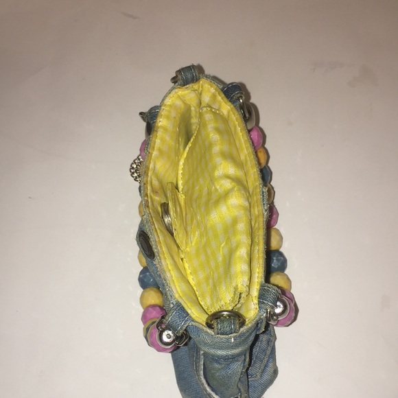 Preowned denim purse with beaded handles and peace patches. - Picture 6 of 7